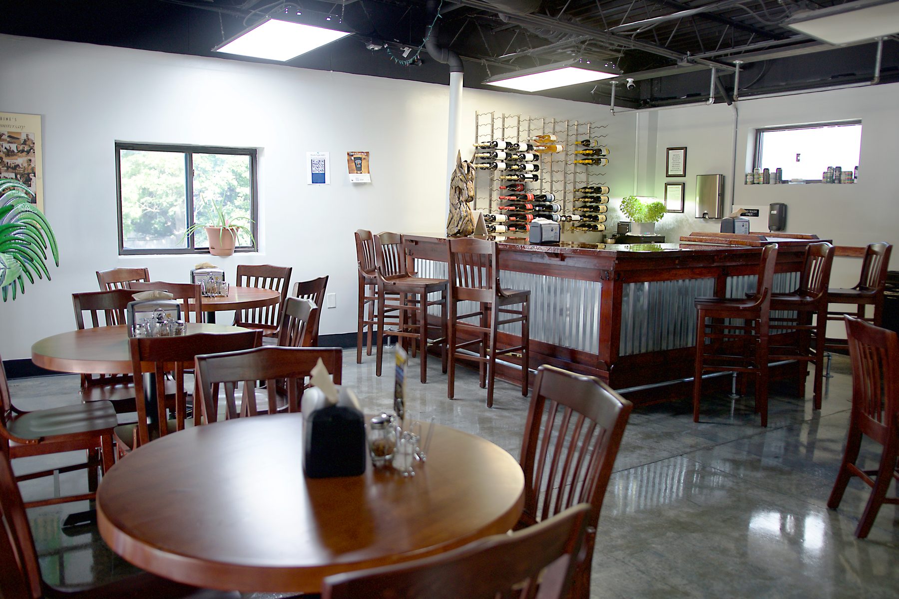 Black-Type Brewing taproom with tables and bar